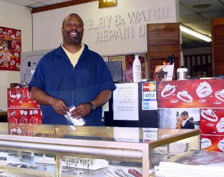 Cunningham's owner behind the counter